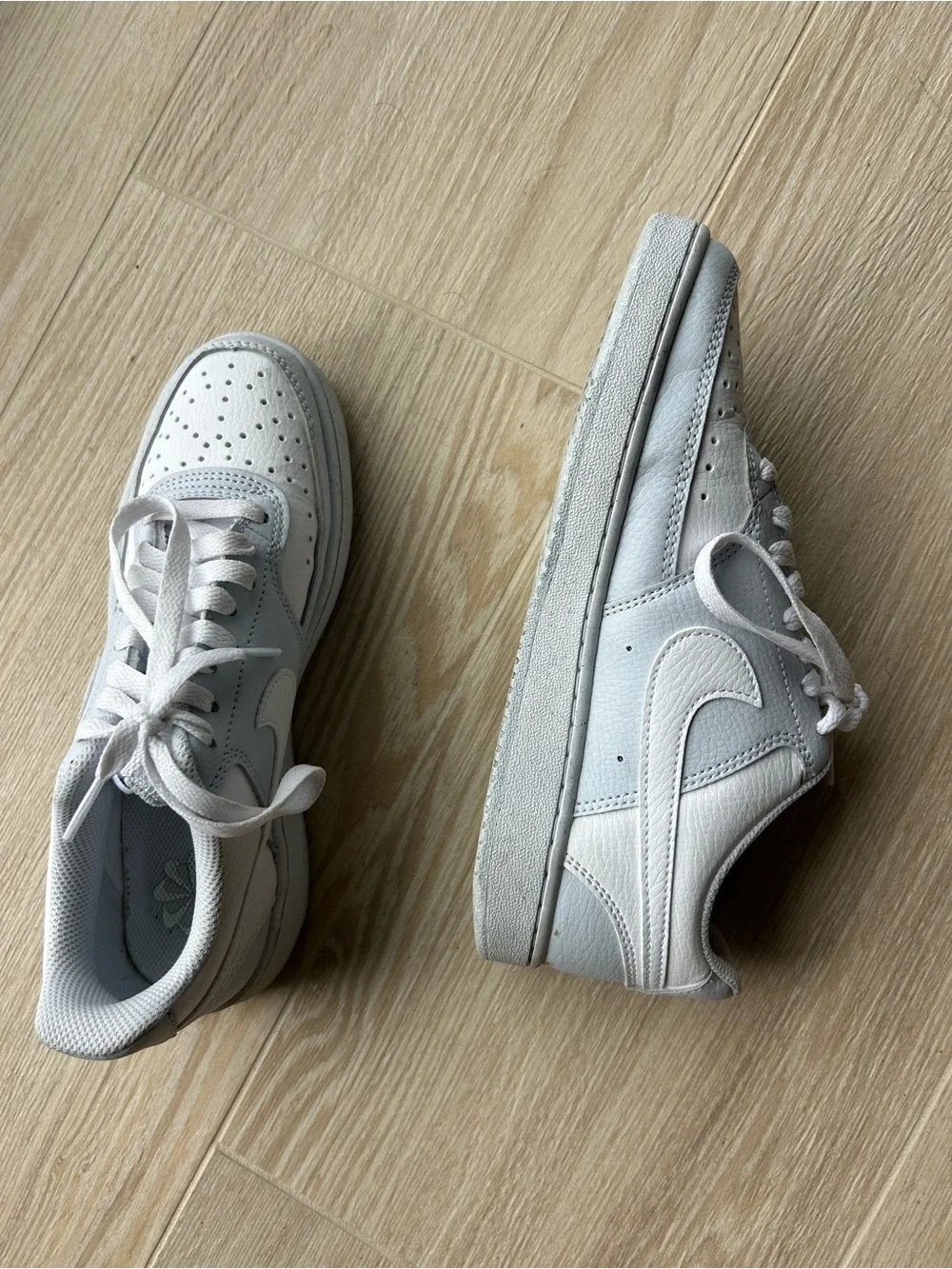 Nike White Low-Top Leather Sneakers with Subtle Gray Accents